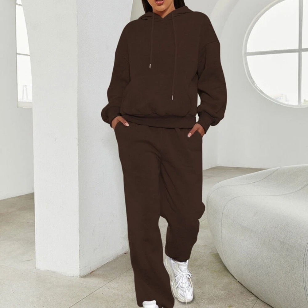 2 piece jogger / hoodie set. New but out of package / bags. Never worn